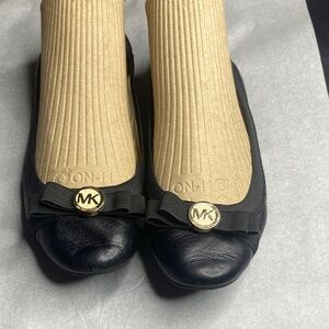 Michael Kors Black Flats with Gold Emblem